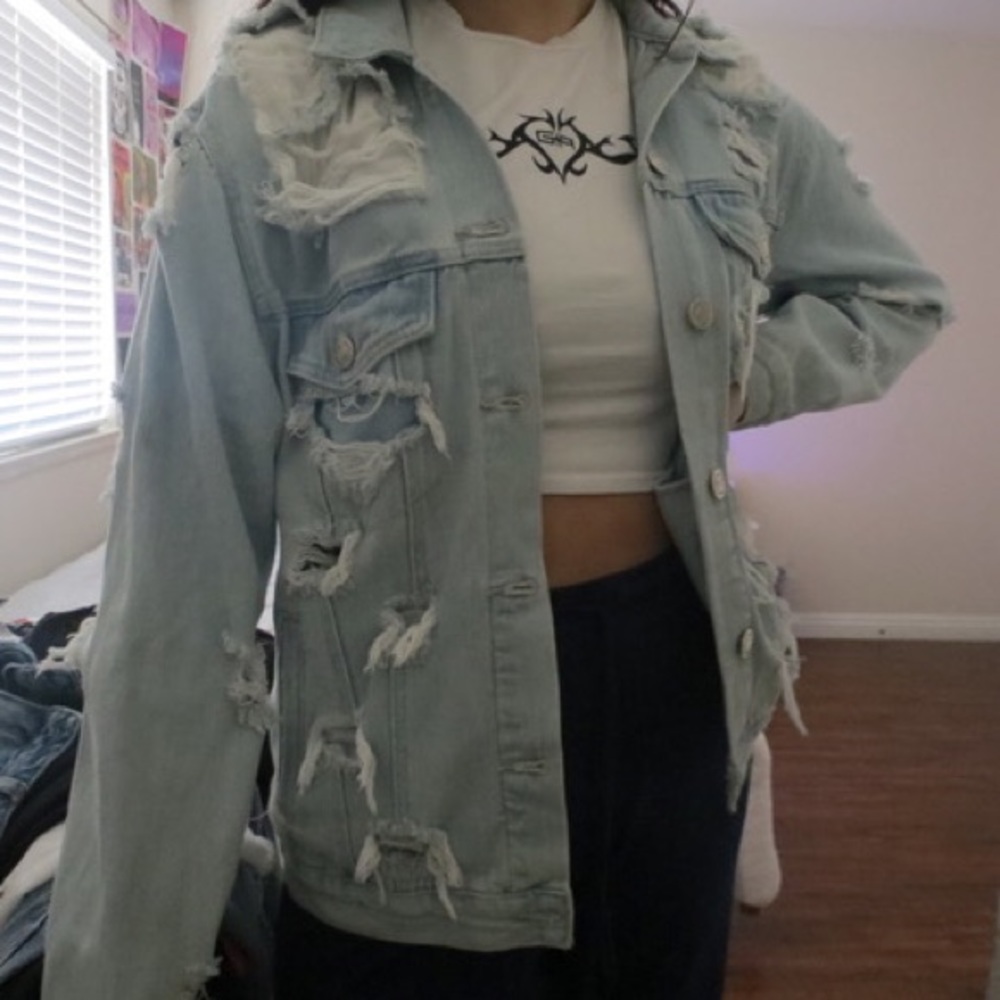 Distressed denim jacket
